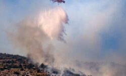 Accused of deliberate arson/The Greek mayor in custody after suspicions that he caused the fire near Athens